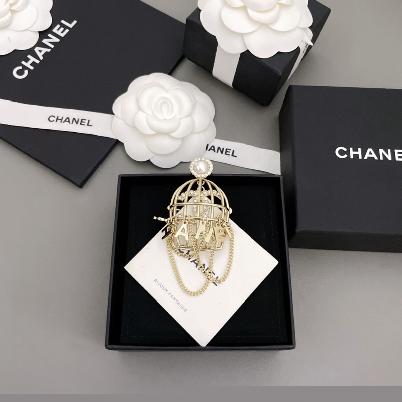 Ch*el brooches
